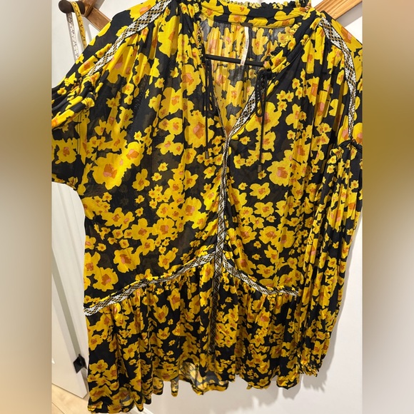 Free People Love Letter Floral Tunic Blouse in a black and yellow floral print. - Picture 8 of 11